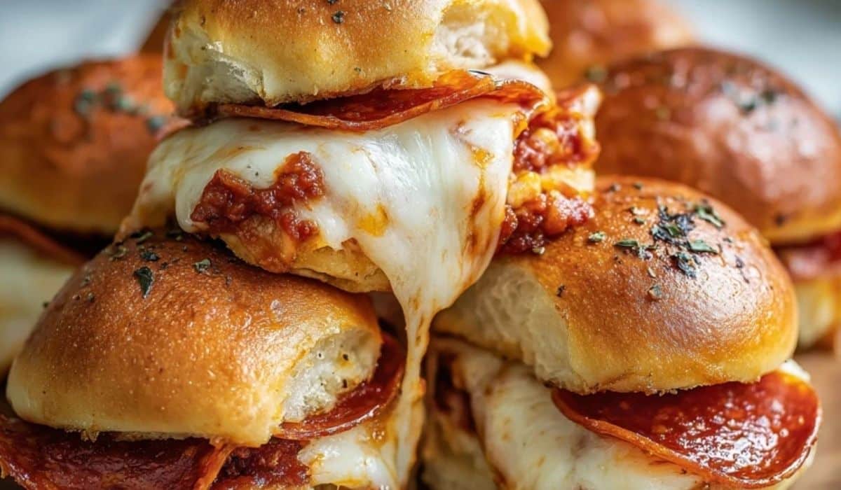 Cheesy Pepperoni Pizza Sliders baked to golden perfection with melty mozzarella and pepperoni