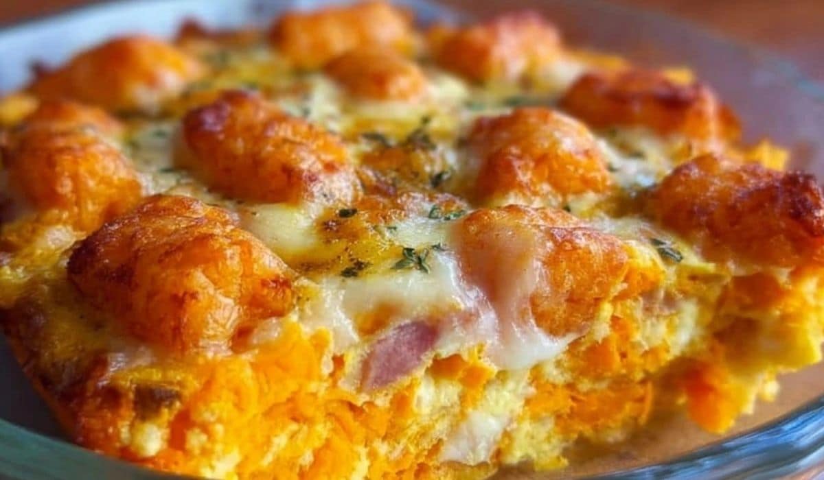 Sweet Potato Tot Breakfast Casserole baked with golden cheese and crispy tots