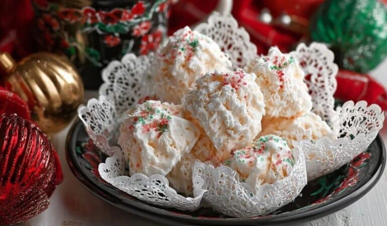 Foolproof No-Cook Divinity Candy in a festive holiday display with red and gold ornaments