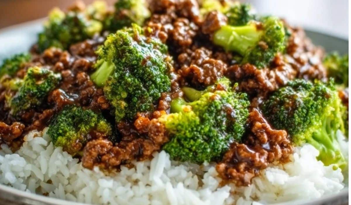 Honey Garlic Ground Beef and Broccoli served on fluffy white rice in a rustic ceramic bowl