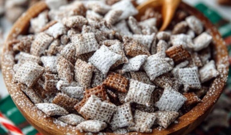 Overhead view of Chex Mix Puppy Chow in wooden bowl