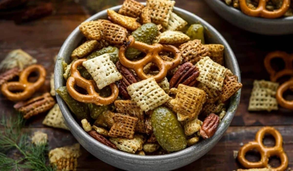 Featured image of Dill Pickle Snack Mix Recipes served in a rustic bowl