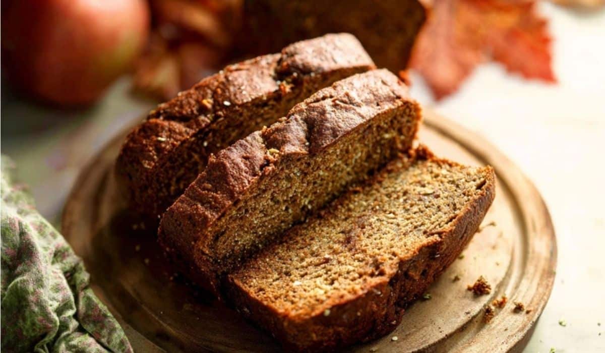 Harvest Spice Bread on rustic board with fall background
