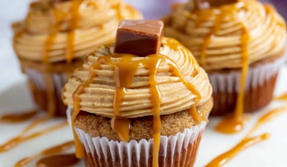 Salted Triple Caramel Cupcakes flat lay with caramel drizzle