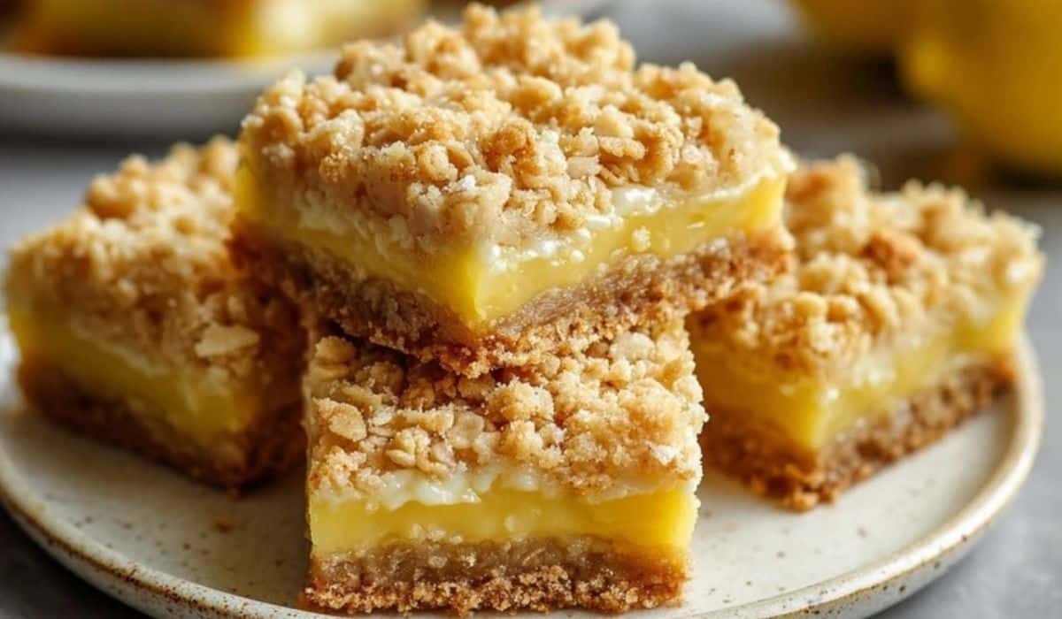 Lemon Oatmeal Crumble Bars served on white ceramic plate