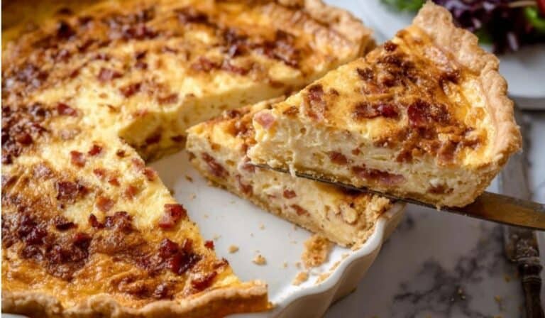 Quiche Lorraine baked until golden with bacon and Gruyère in a flaky crust